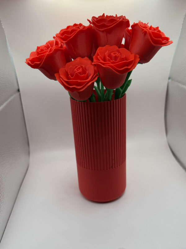 Red vases and red roses